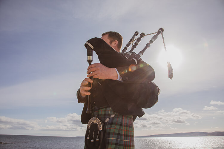 Bagpipes played on the Isle of Arran coast at the Dougarie Boathouse